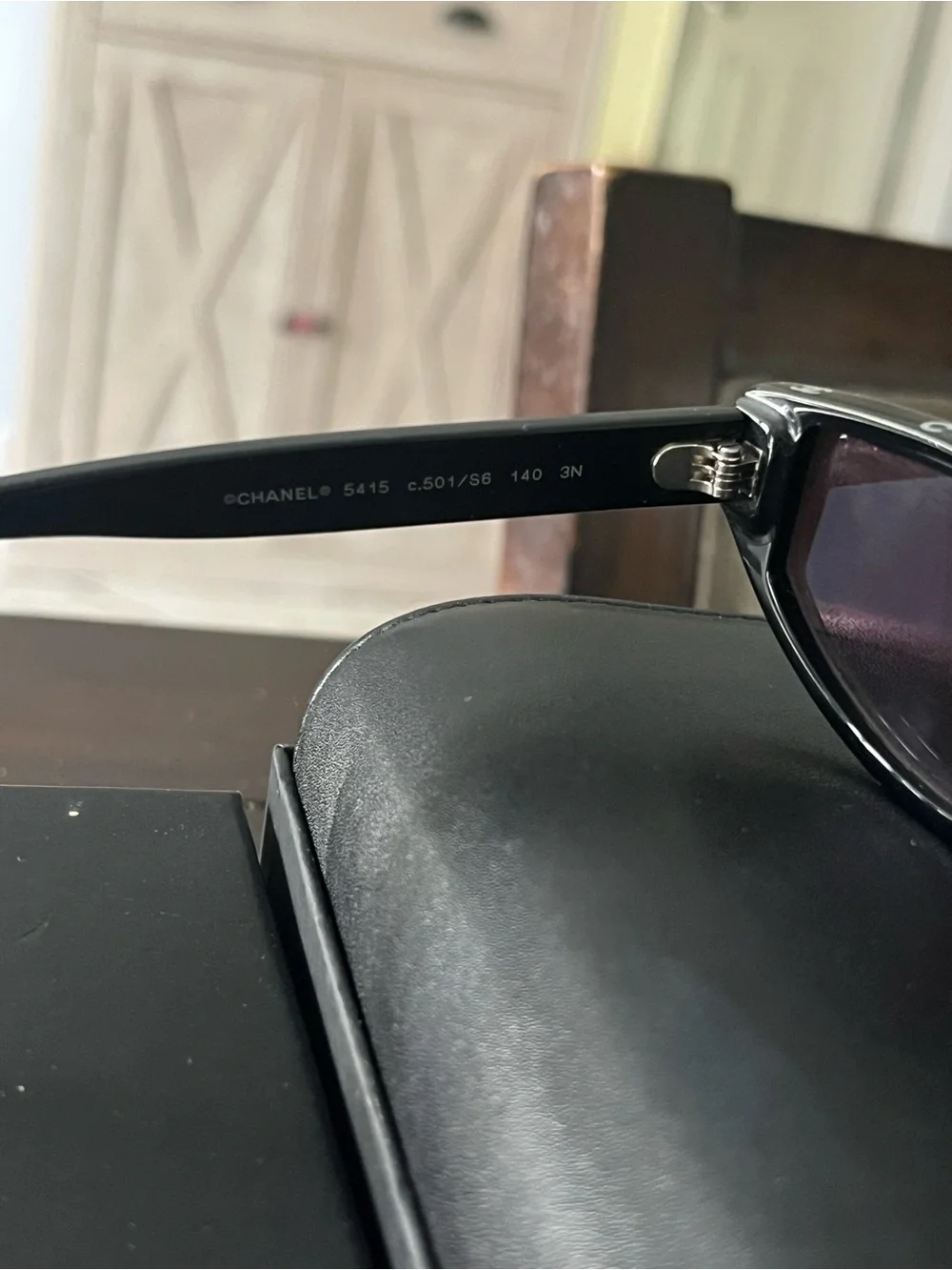 CHANEL Black Slim Cat-Eye Sunglasses with Dark Lenses